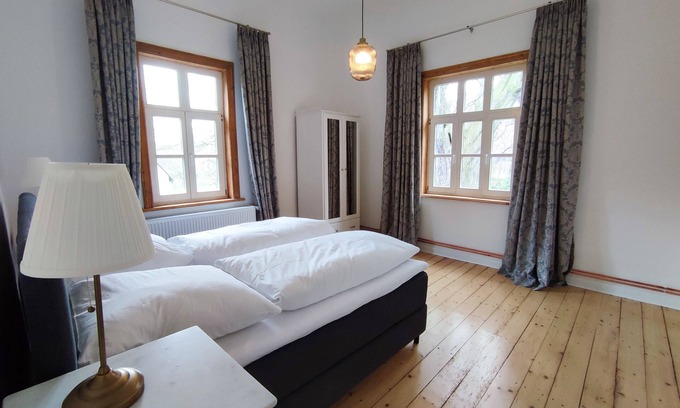 Oker Apartment | Historic Apartment Retreat with Pool & Breakfast Included