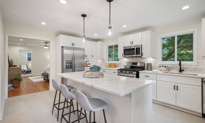 North Decatur House | Modern 4-Bedroom Retreat with Chef's Kitchen & Ocean View