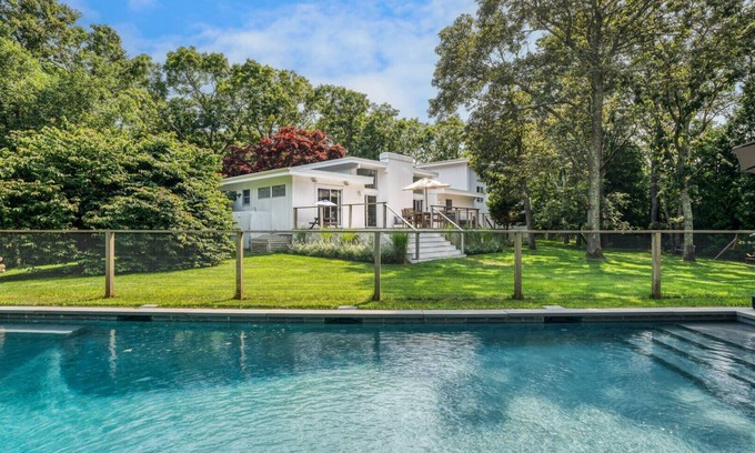 Village of East Hampton House | Modern Mid-Century Ranch with Oceanfront Views & Spa