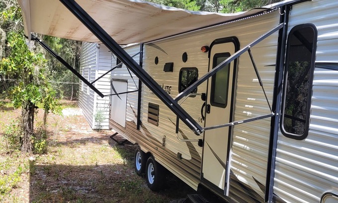 Painters Hill House | Experience the Beach in a Spacious RV with Outdoor Kitchen