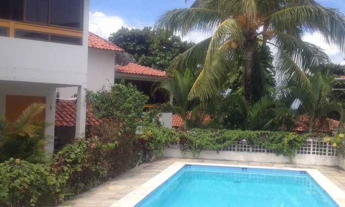 Ipojuca House | Experience a Family Retreat by the Beach in Porto