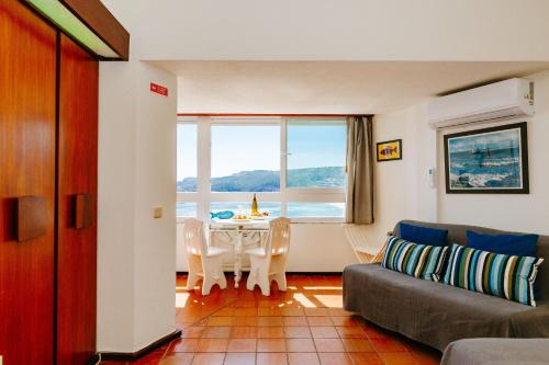 Santiago Apartment | Idyllic Ocean View Studio at Rent4rest in Sesimbra