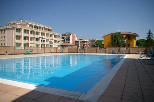 Lido degli Scacchi Apartment | Inviting Residence Alfiere: Ocean View & Private Beach