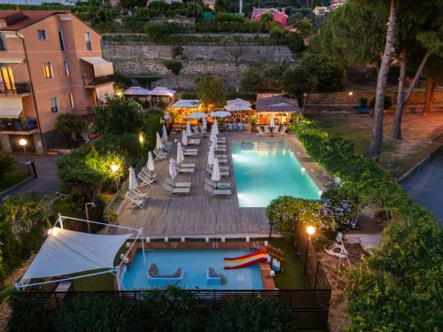 Pietra Ligure Apartment | Discover Residence Holidays: Oceanfront Retreat with Pool