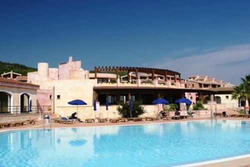 Villaputzu Apartment | Discover Residence Il Borgo di Porto Corallo with Ocean Views