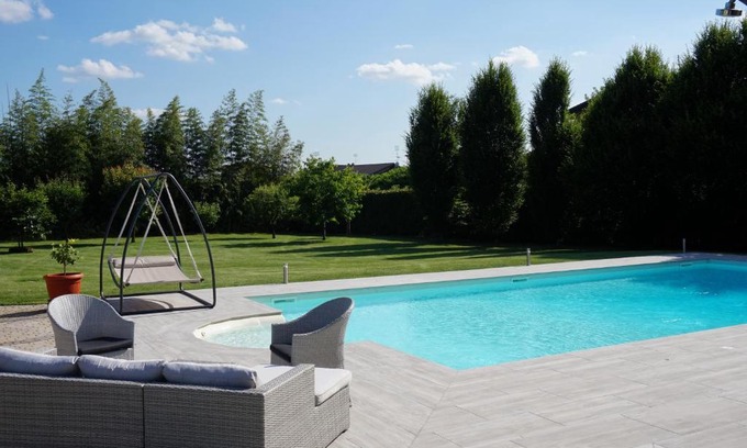 Torrazza Piemonte Apartment | Experience Tranquility at Residence Le Palme with Ocean Views