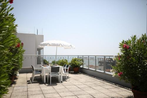 Lido di Jesolo Apartment | Experience Oceanfront Bliss at Residence Mariavittoria