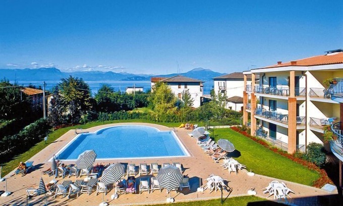 San Benedetto di Lugana Apartment | Top-Rated Residence Nettuno with Oceanfront Pool Access