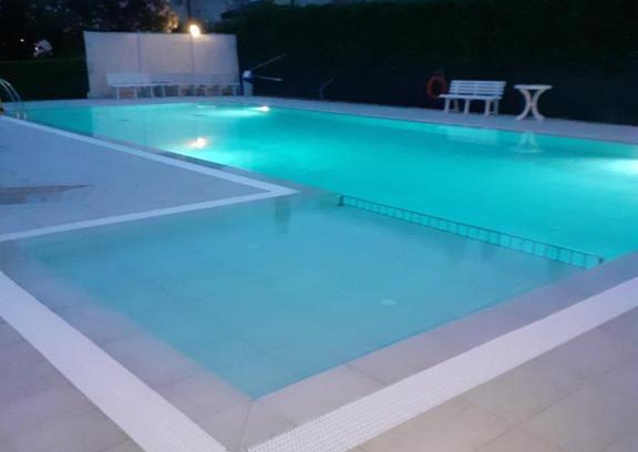 Faro Apartment | Pet-Friendly Residence Puccini with Pool & Family Amenities