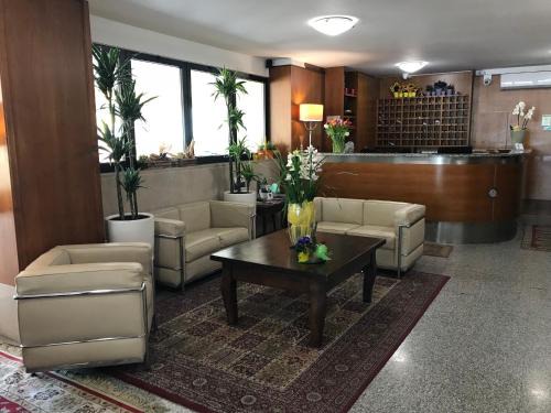 Est Apartment | Ideal Retreat at Residence Viale Venezia with Hot Tub Access