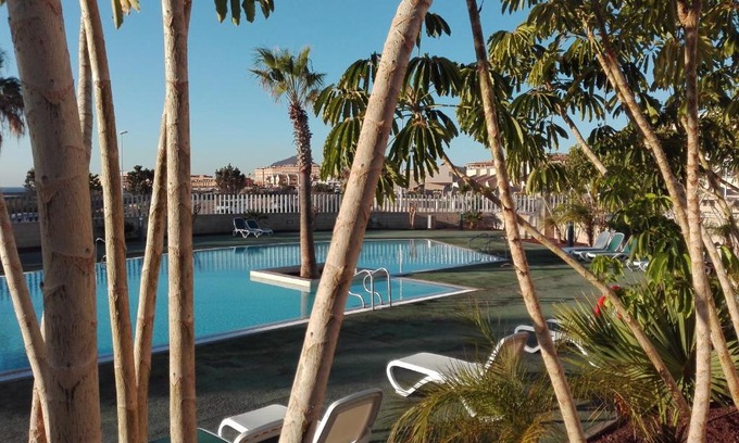 El Medano Apartment | Oceanfront Bliss at Residencial Los Martines, Rated 9.6/10