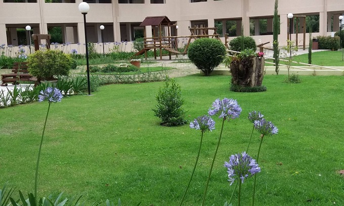 Campos do Jordao Apartment | Discover Residentiel Yy Ete Et Hiver: Mountain Retreat with Wi-Fi