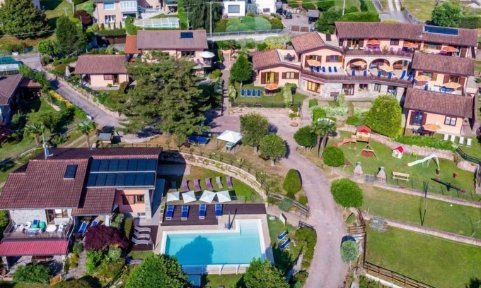 Luino Apartment | Oceanfront Residenza Agrifoglio with Spa and Pool Access