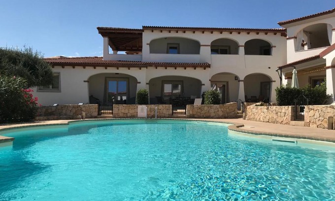 Limpiddu Apartment | Discover Residenza Limpiddu: Oceanfront Bliss with Pool