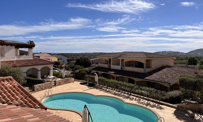 Limpiddu Apartment | Experience Residenza Limpiddu: Pool and Sea Views Await