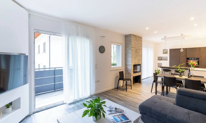 Nago-Torbole Apartment | Experience Comfort at Residenza The Rock with Balcony & Wi-Fi