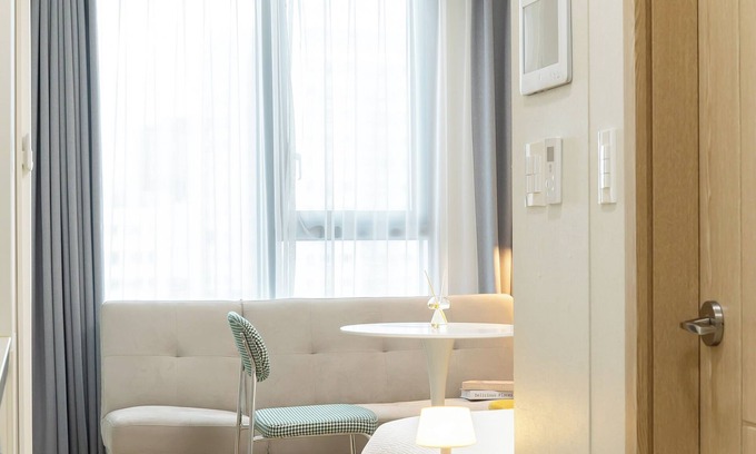 Jung-gu Apartment | City View Retreat with Spa, High Floor & Family Amenities