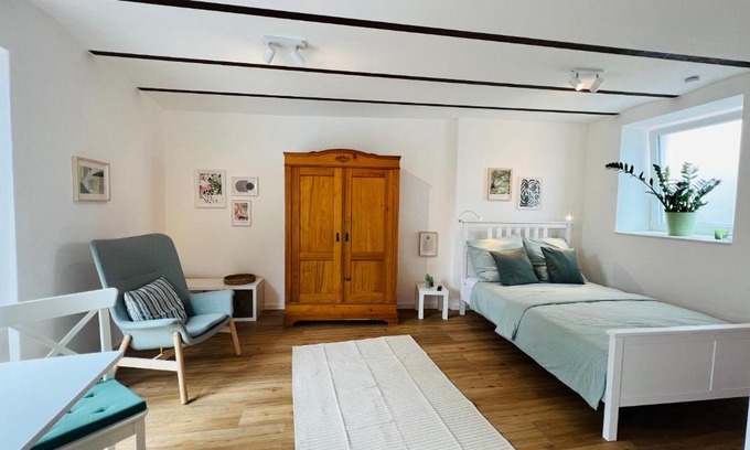 Großfischlingen Apartment | Historic Building with Private Courtyard and Parking