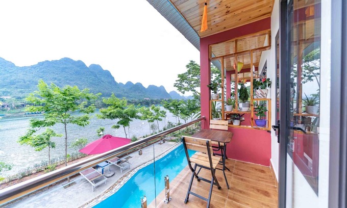 Phong Nha Hotel | Tranquil River Bungalow: Guest Rated 9.2 with Pool & Dining