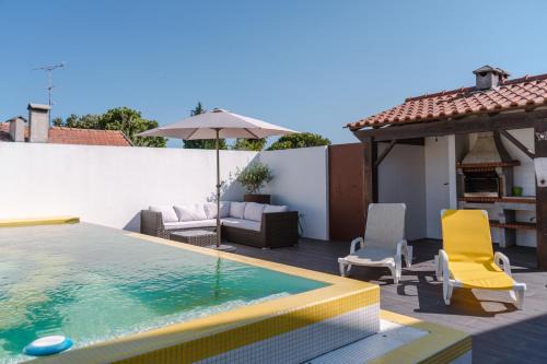 Murtosa House | Relax at Retiro da Atafona Beach Pool House with Family