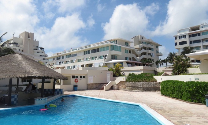 Punta Cancun Apartment | Experience the Allure of Cancun with Oceanfront Amenities