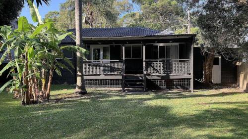 Macmasters Beach House | Charming Retro Beach House - Ideal for Families & Pets