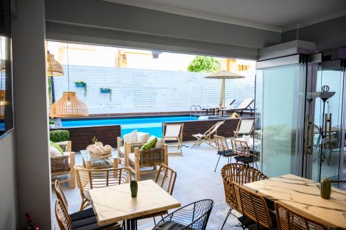 Olymbiaki Akti Apartment | Vintage Luxury Rooms with Ocean View and Pool Access