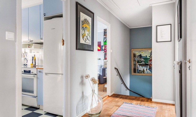 Skarpnack Apartment | Retro Retreat: Embrace Modern Comforts & Inviting Amenities