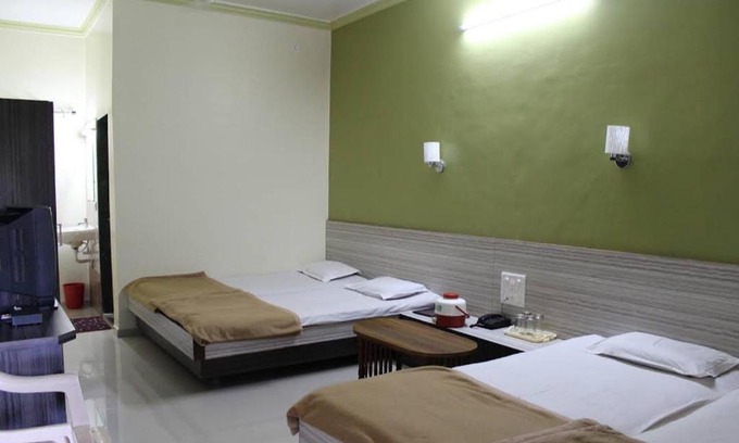 Ambaji Hotel | Experience Reva Prbhu Sdan: Family-Friendly with Pool Access