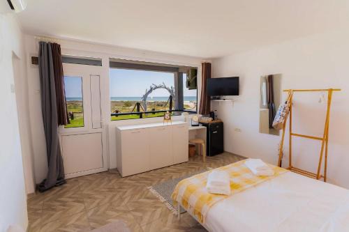 Vadu Apartment | Experience Oceanfront Bliss at Rezident Corbu Hotel