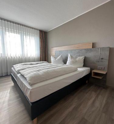 Woerrstadt Hotel | Rheinhessen Inn GmbH: Family-Friendly Retreat with Breakfast