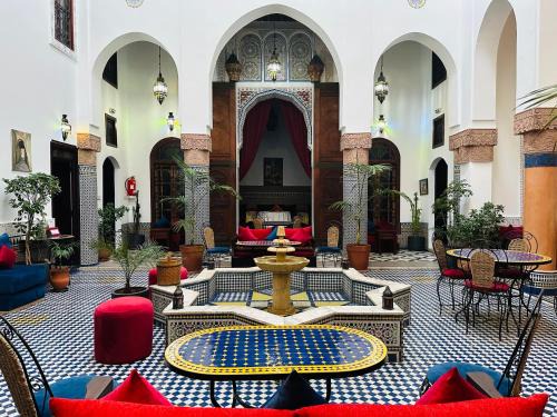 Ain Azlitan House | Discover Riad Ahlam: 4-Star Stay with Family-Friendly Dining