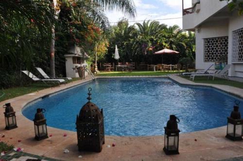 Harhoura House | Idyllic Riad Alhambra: Oceanfront Oasis with Spa & Pool