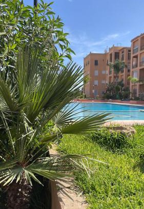 Mohammedia Apartment | Inviting RICO FLORES PALM: Family-Friendly with Pool Access