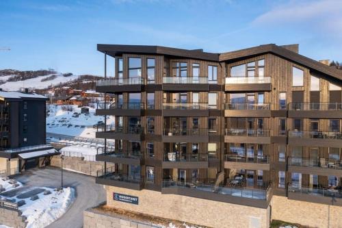 Beitostolen Apartment | Discover Riddertunet: Central Getaway for Families & Pets