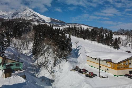Akakura Ski Chalet | Cozy Ski In Ski Out Myoko Chalet with Child-Friendly Amenities