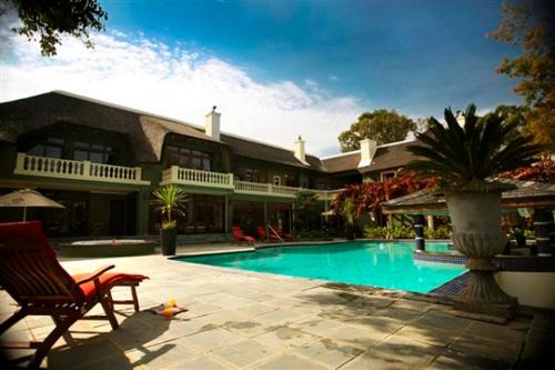 Trawal Bed & Breakfast | Discover Ridgemor Villa: Oceanfront Escape with Pool Access