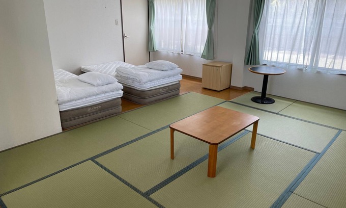 Towa Hotel | Cozy Retreat by Katasoehama Beach with Family-Friendly Perks