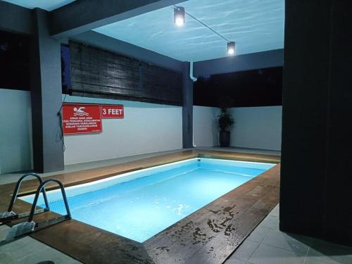 Cherating House | Comfortable Stay at RINA HOMESTAY Kemaman with Pool Access