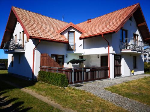 Ostrowo House | Rivabell: Oceanfront Retreat with Family-Friendly Amenities
