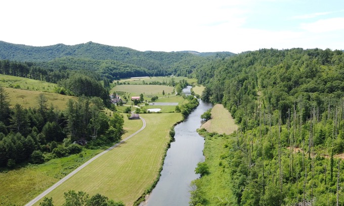 West Jefferson Cabin | Idyllic River Front Cabin with Private Ponds & Hiking Trails