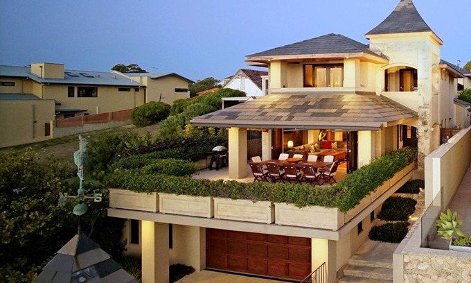 Applecross House | Relax at the Inviting River Front Home with Ocean Views