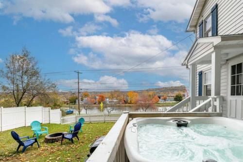 Ithaca House | Idyllic River Front Home in Central Ithaca with Hot Tub