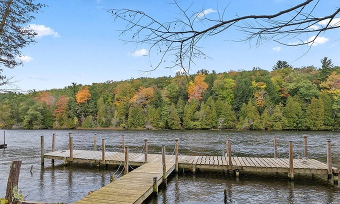 Newaygo Cottage | River Front Home with Breathtaking Views & Private Island