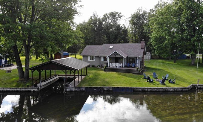 Brutus House | Idyllic River Front Home with Chain of Lakes Access