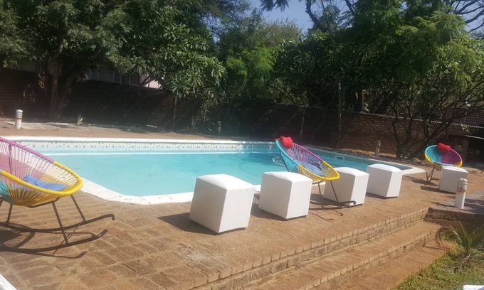 Gaborone Bed & Breakfast | Discover River-Ridge Guest House with Pool and Breakfast