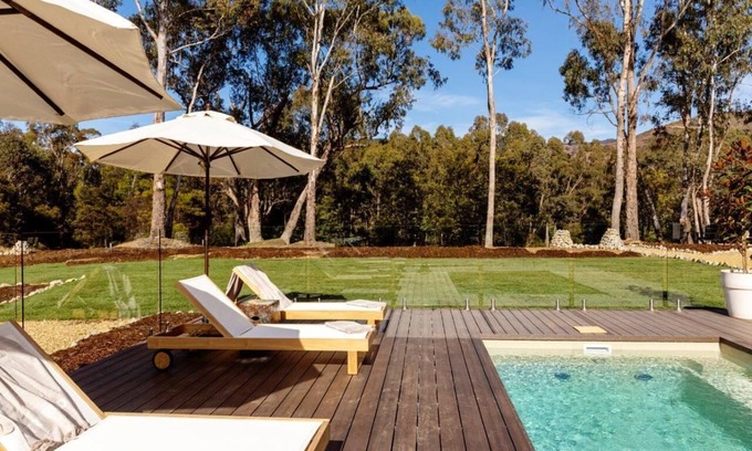 Bright Villa | Secluded River Run: Executive Retreat with Ocean Views