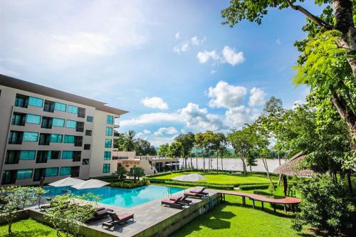 Chiang Khan Hotel | Experience River Tree Resort: Oceanfront Bliss Awaits