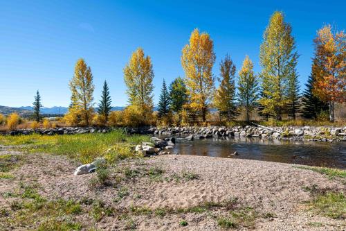 Granby Apartment | Riverbend views ten feet away