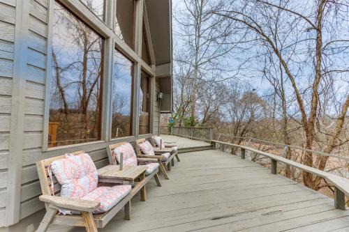 Treece House | Riverfront Baxter Springs Home with Deck & Family Amenities